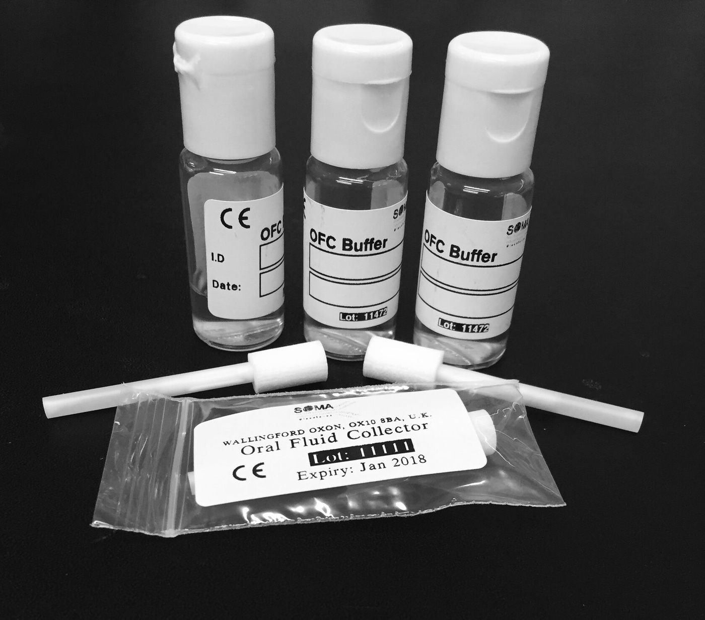 Три флакона буфера, два тампона и запаянный пакет коллектора Oral Fluid Collector
